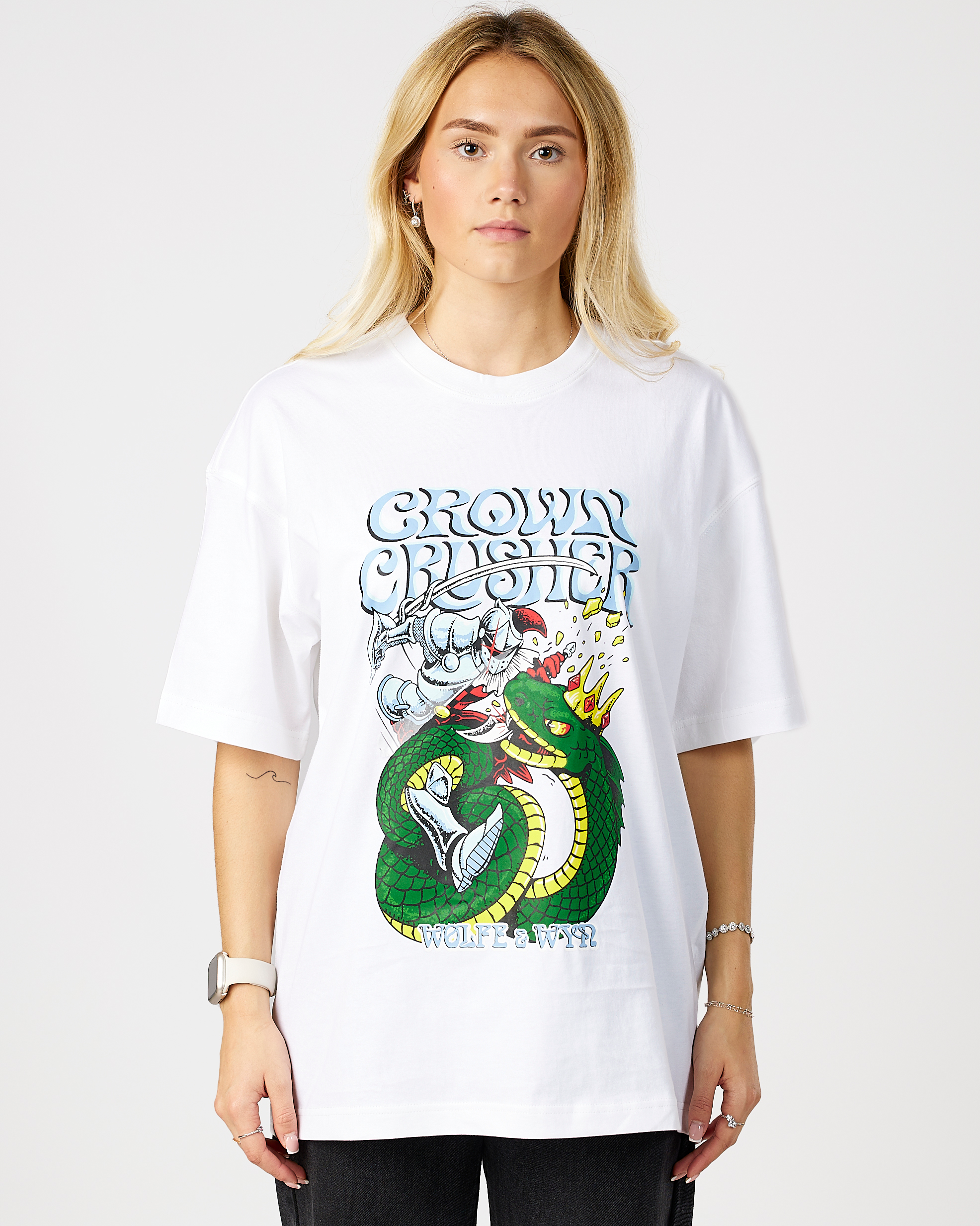 model wearing a white t-shirt with a graphic design on a plain background