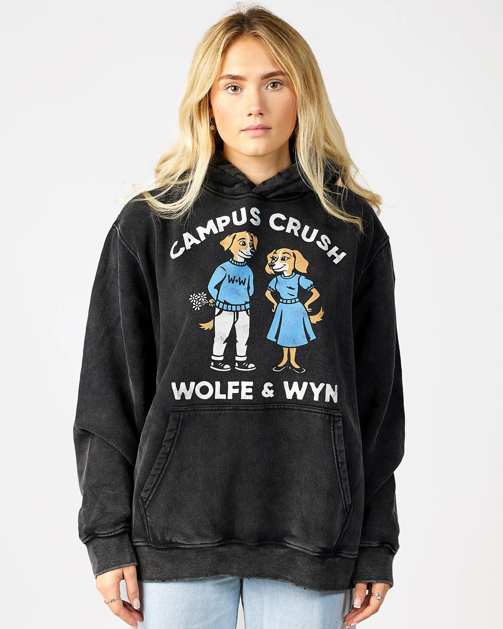 Person wearing a black hoodie with 'Campus Crush' design and text, on a white background
