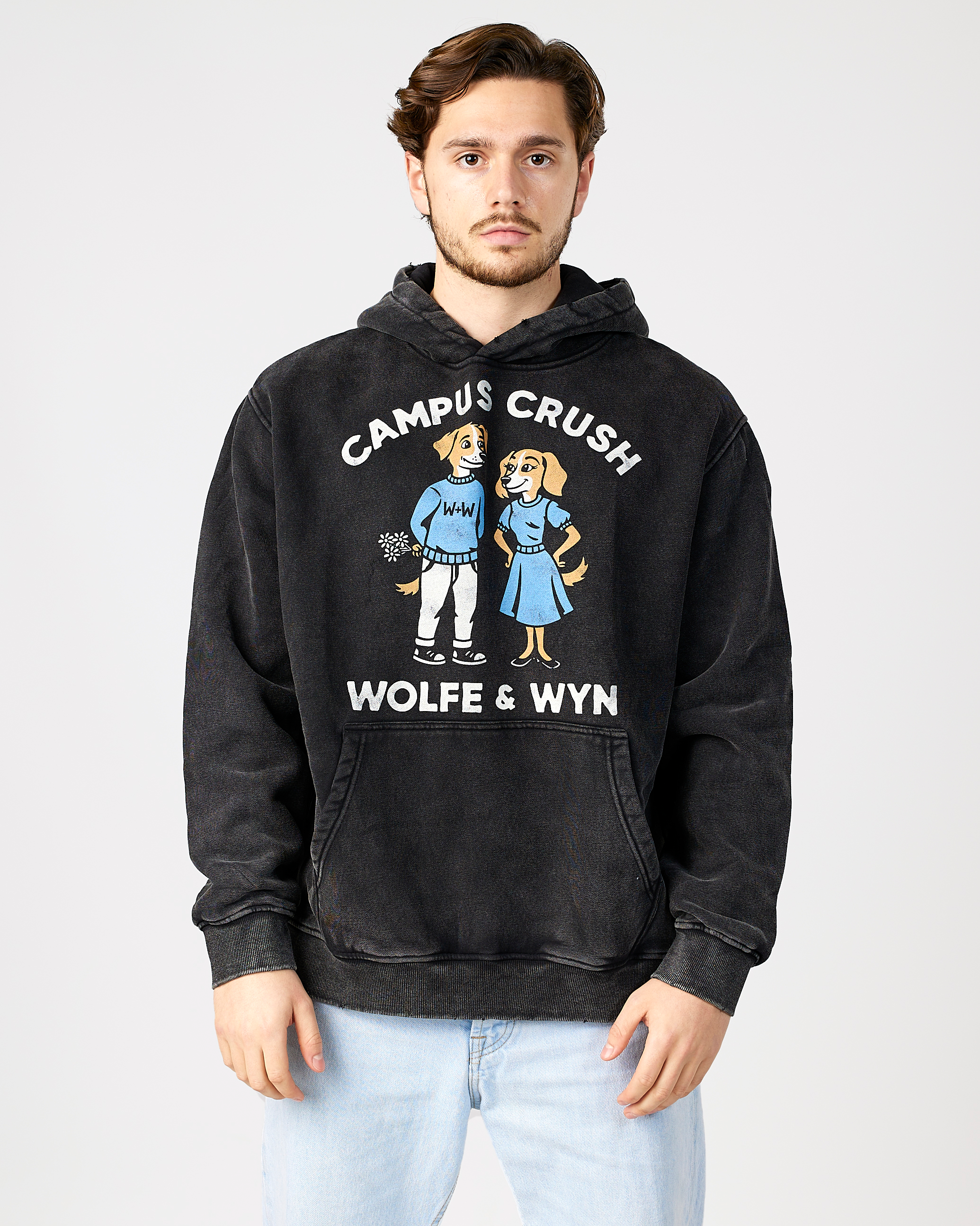 model wearing a black hoodie with 'Campus Crush' design on a light gray background