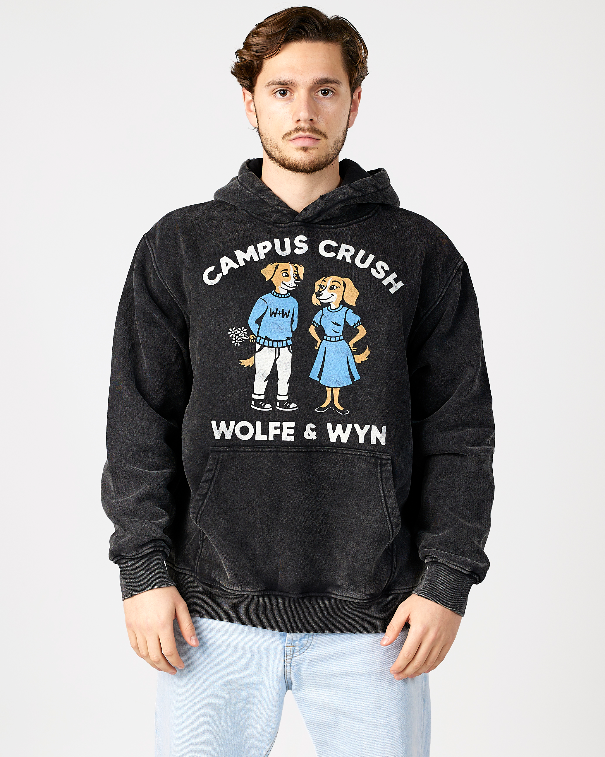 model wearing a black hoodie with 'Campus Crush' design and text, on a plain background