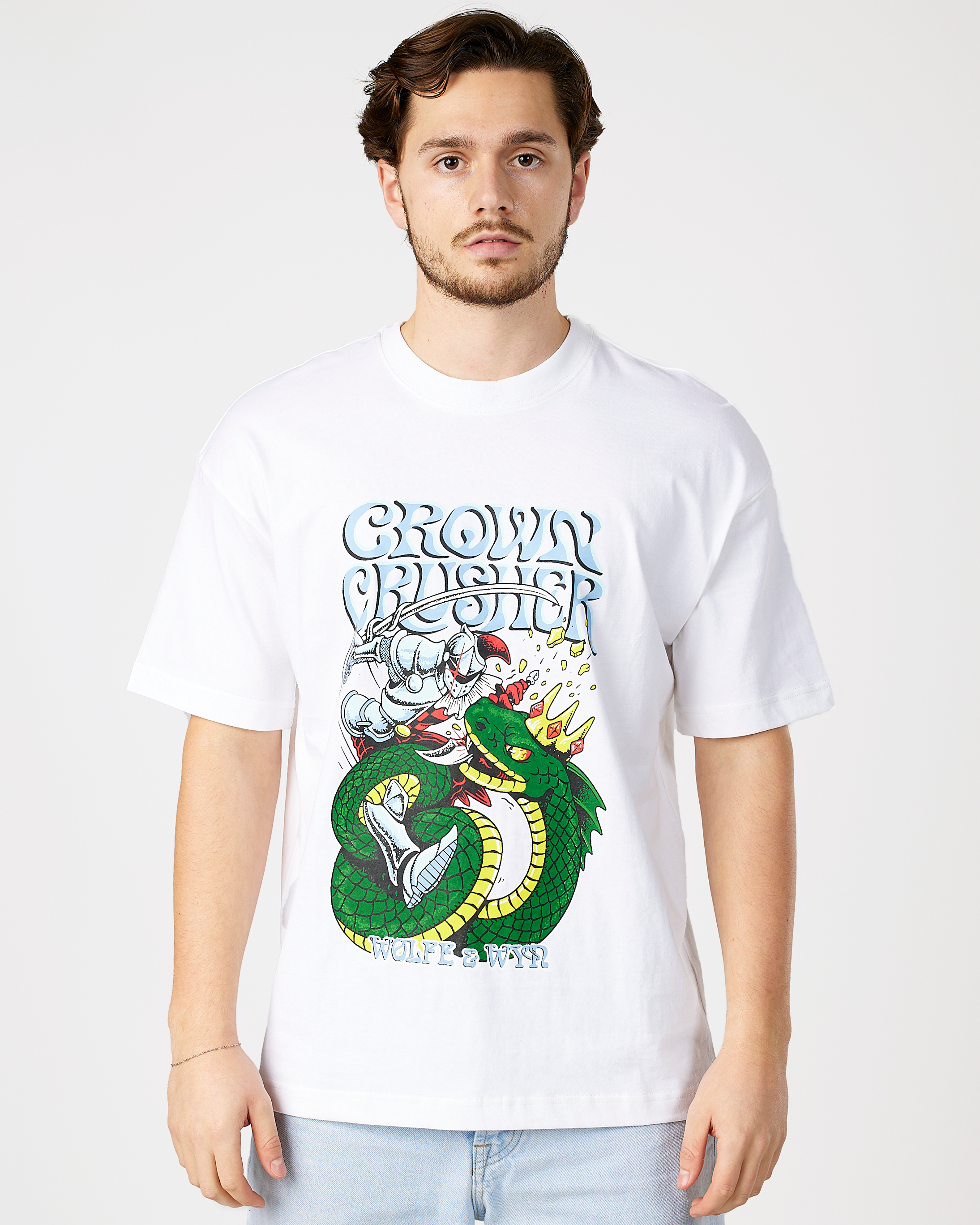 model wearing a white t-shirt with a graphic design on a plain background