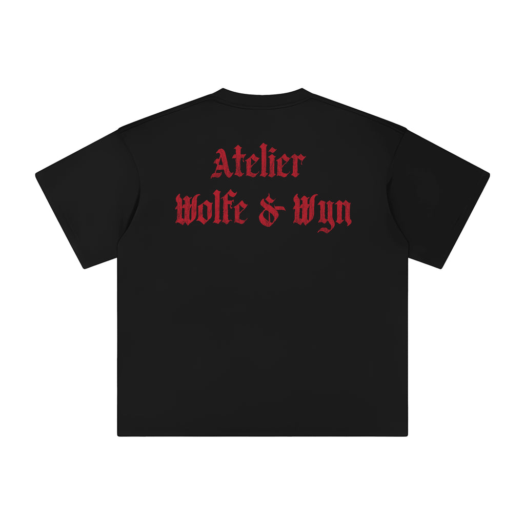 Black t-shirt with red text 'Atelier Wolfe & Wyn' on a white background