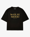 Black tee with gold text 'WOLFE MOOD' on a white background